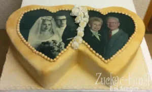Fototorte: Doppelherz-Form mit zwei Fotos (Hochzeit und Alter) für Jubiläum.